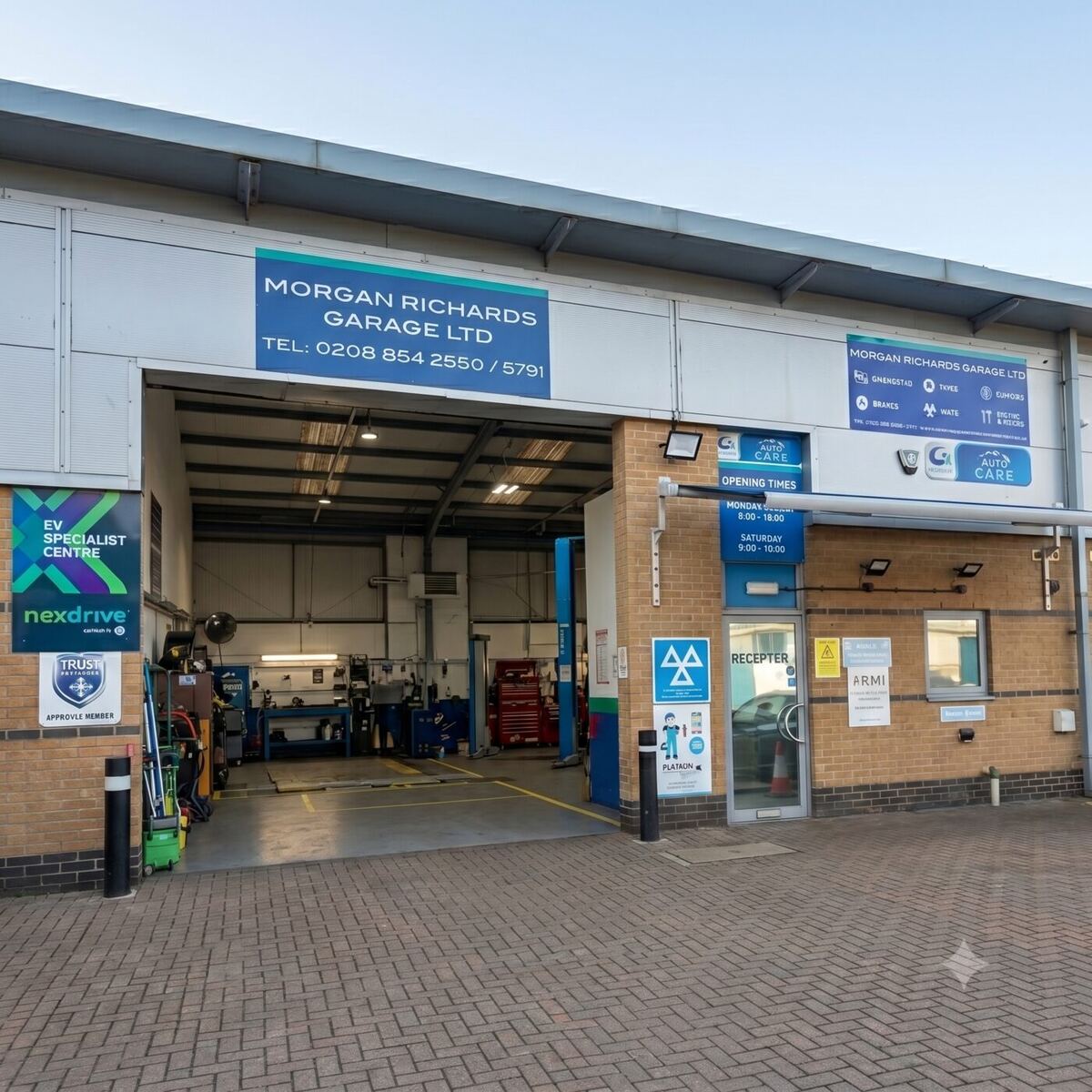 Morgan Richards Garage forecourt showing Nexdrive EV Specialist Centre signage